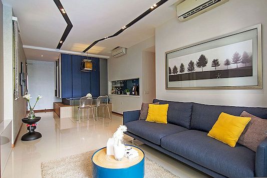Asymetrický bytový design s vlnitými povrchy v Singapuru