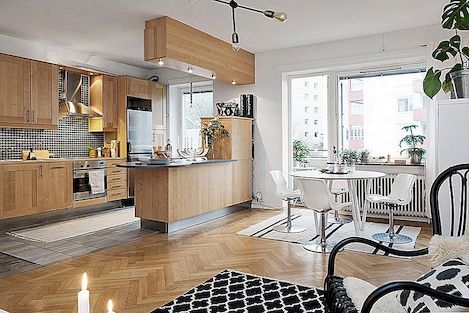 瑞典明亮的两室公寓展示了有趣的现代布局