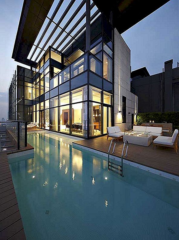 Glaserad dubbelhöjd Penthouse med utsikt över Urban Jungle