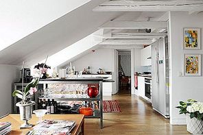 Loft Stockholm Interior Design met wit geschilderde balken