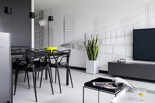 Mannelijk zwart en wit appartement gekruid met kleurrijke details