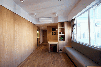Mikro lägenhet med glidande möbler och en öppen design