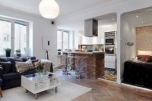 Klein en gezellig Zweeds appartement met een bakstenen keukenbar