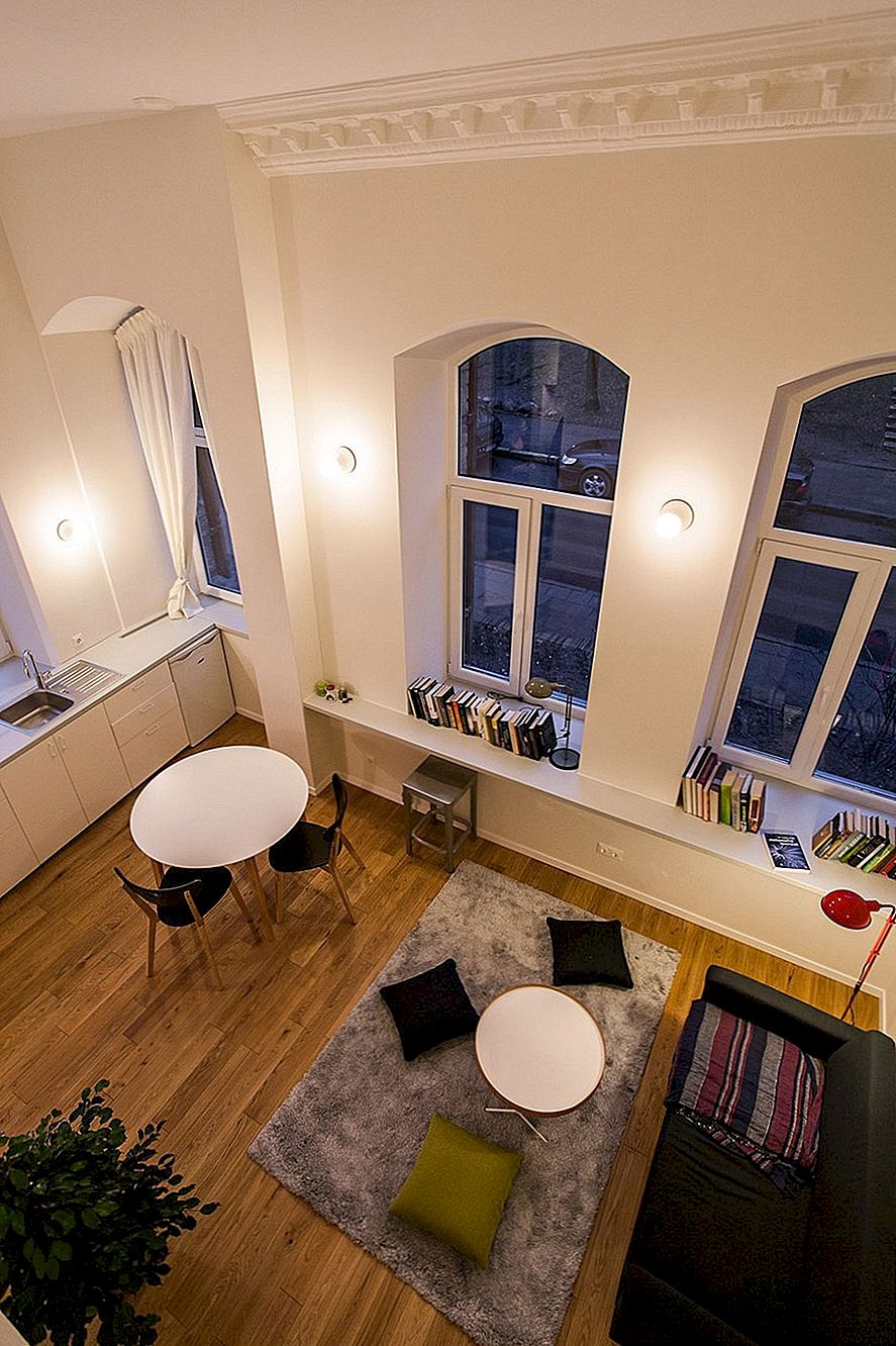 Liten lägenhet design inom ett tegelhus i Vilnius, Litauen