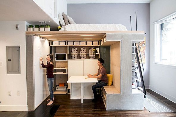Kleine loft ontworpen als een multifunctionele en moderne ruimte