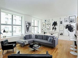 Rymlig svart, vit och grå lägenhet