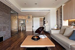 Snygg och rymlig lägenhet som integrerar en rörlig vägg