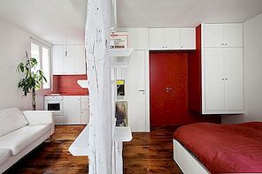 Överraskande liten lägenhet i Paris med en charmig röd och vit inredning