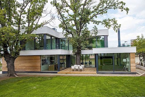 Suvremena kuća koja je integrirala stabla u svoju modernu arhitekturu: 2 Oaks House by OBIA