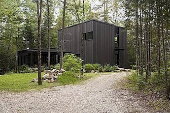 Hilltop Home Mirrors Quebecs Spruce Forests