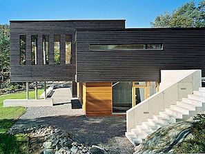 Namas, panašus į medinį laivą Norvegijoje: "Villa Storingavika"