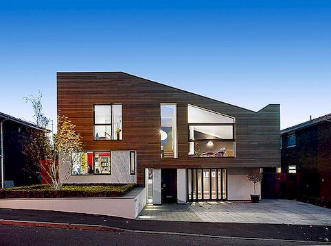 Modern en warm huis met externe bekleding door Stephenson ISA Studio