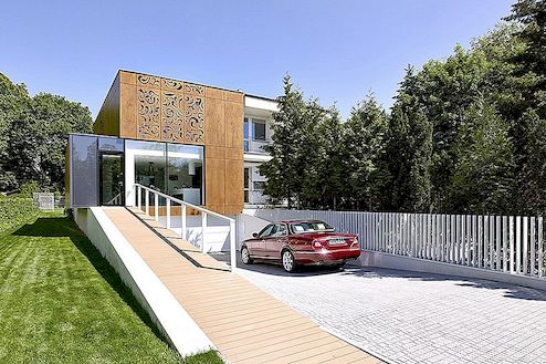Perforovaný dům přizpůsobuje svůj moderní vzhled secesních designových funkcí