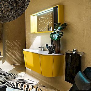 Žlutá zdobená koupelnová koupelna s křivočarými liniemi