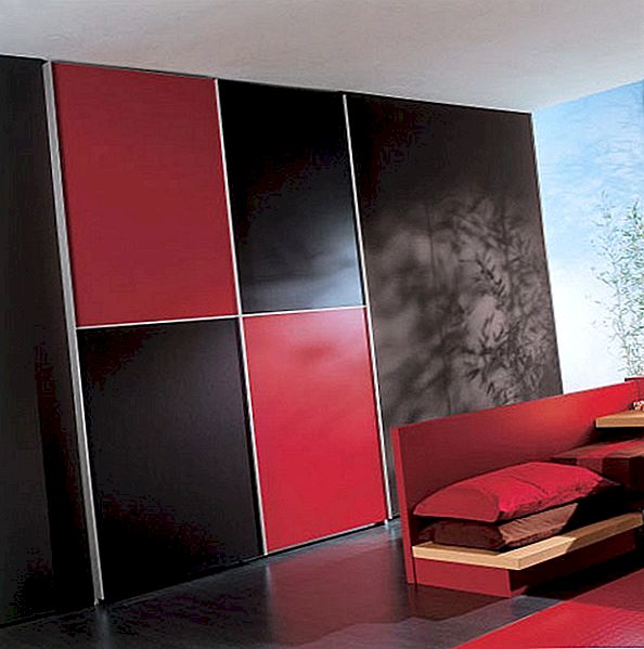 Elegant svart och rött sovrum