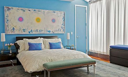 Hoe geef je karakter aan een slaapkamer met een schilderij over het bed