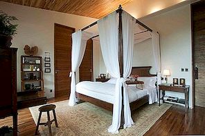 Κρεβάτια με κουβούκλιο δημιουργούν πίσω ένα υπνοδωμάτιο αισθάνεται πιο χαλαρωτικό, άνετο και ζεστό