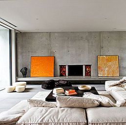 Ugodna betonska rezidencija s narančastim doticajima