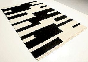 Zwart en crème handgeknoopt / geweven tapijt