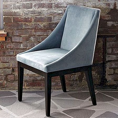 Klasična tapecirana stolica s nježnom siluetom
